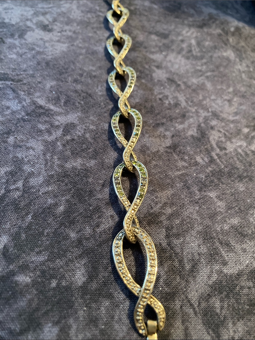 Gold Tone Linked Twist Bracelet with Green Pavé Accents - Women’s Jewelry